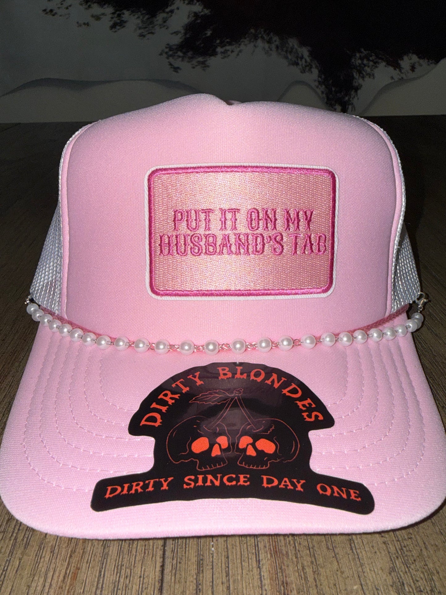 Put it on my husbands tab patch hat