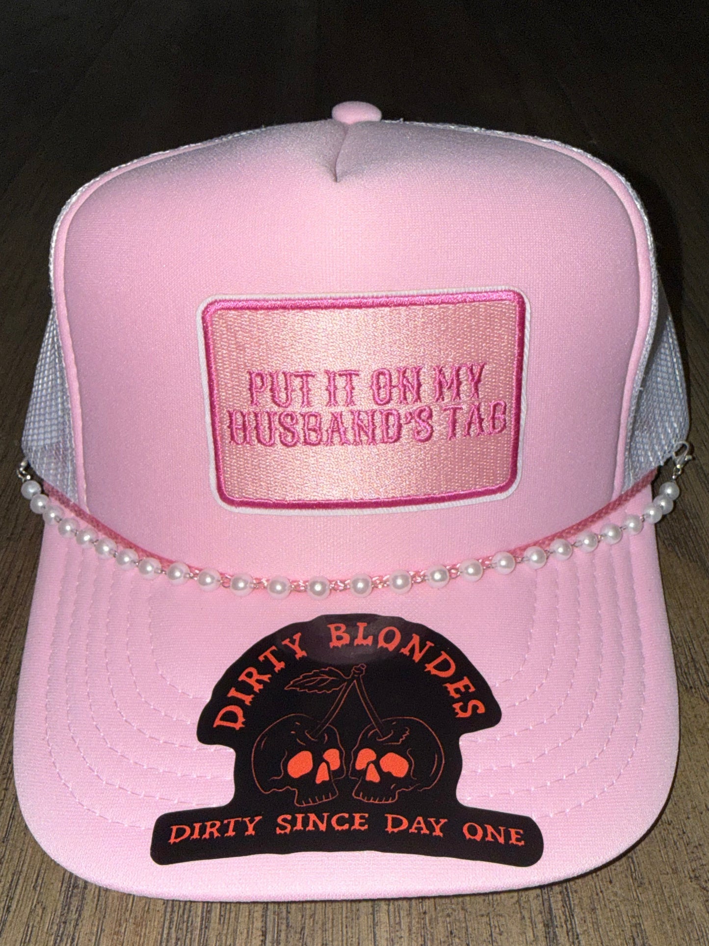 Put it on my husbands tab patch hat